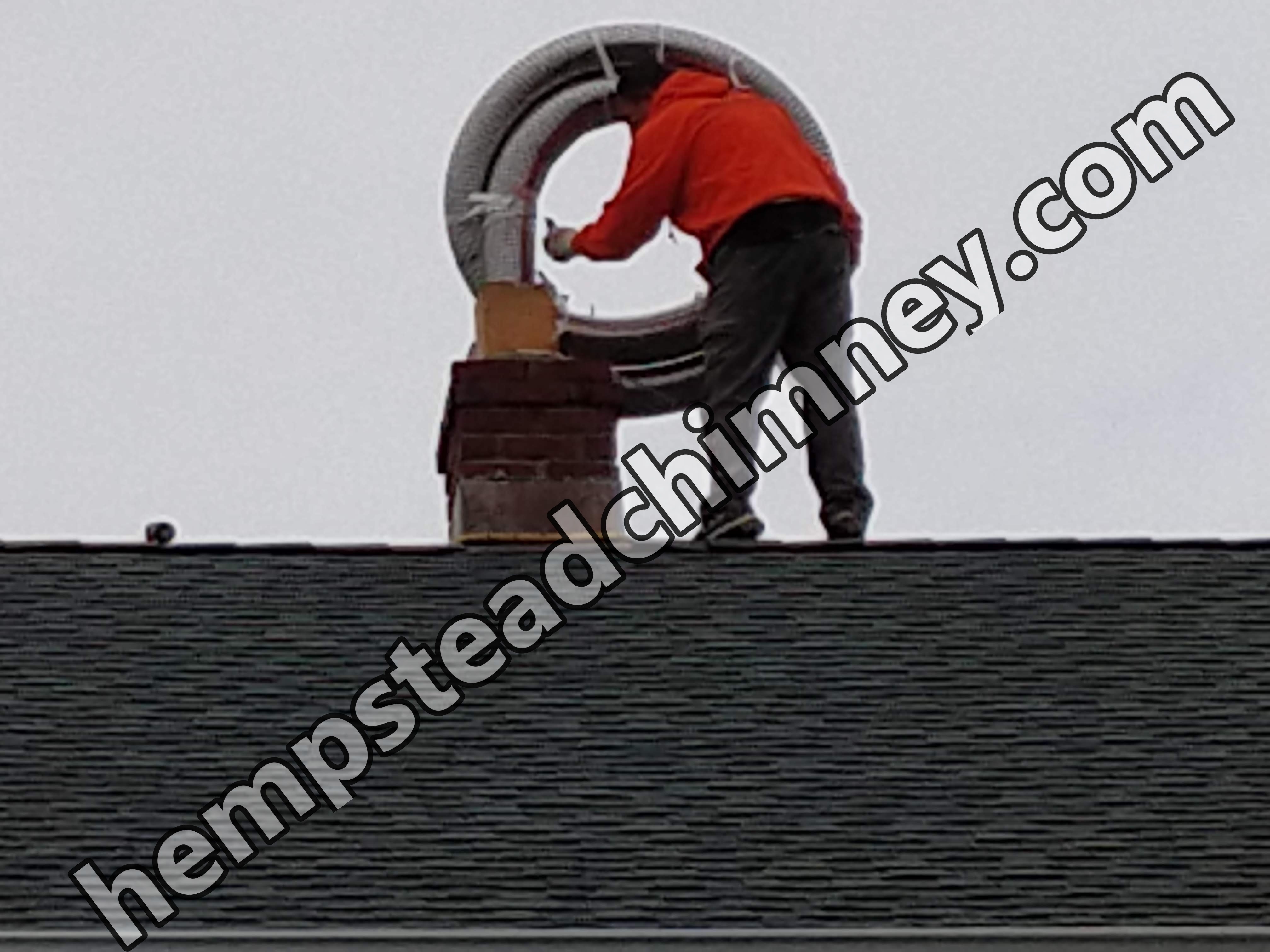 Flexible stainless chimney liner being installed in Gibson, New York
